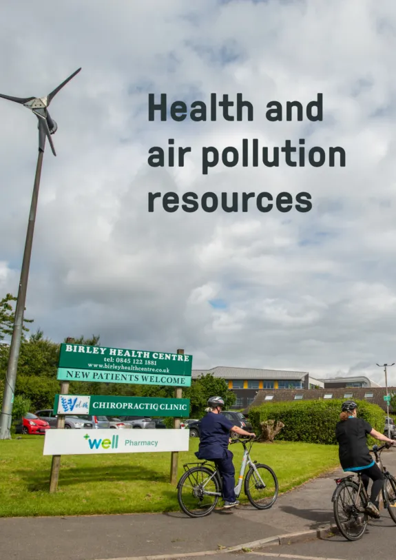 Image of women biking outside a hospital, reading 'air pollution and health resources'