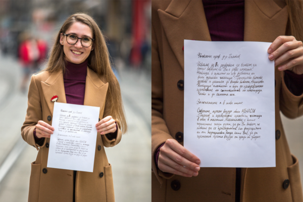 Doctor Teodora Nikolova, a cardiologist, holds one of the letters to policymakers written with smog ink.