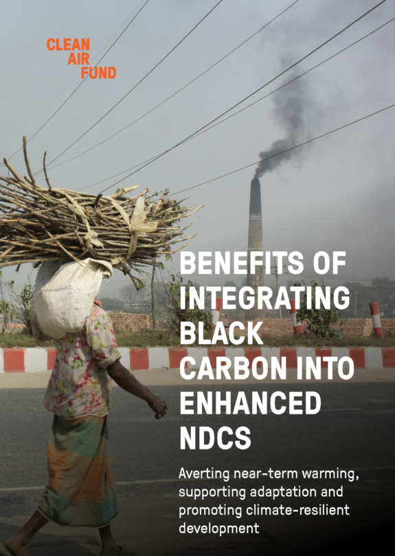 Cover of report showing a man walking with black carbon smoke from a brick kiln