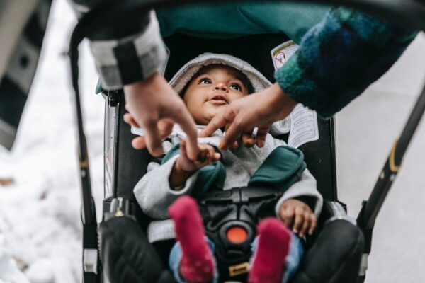 Parents with baby in carriage