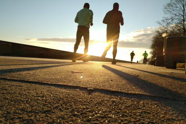 People jogging during sunset
